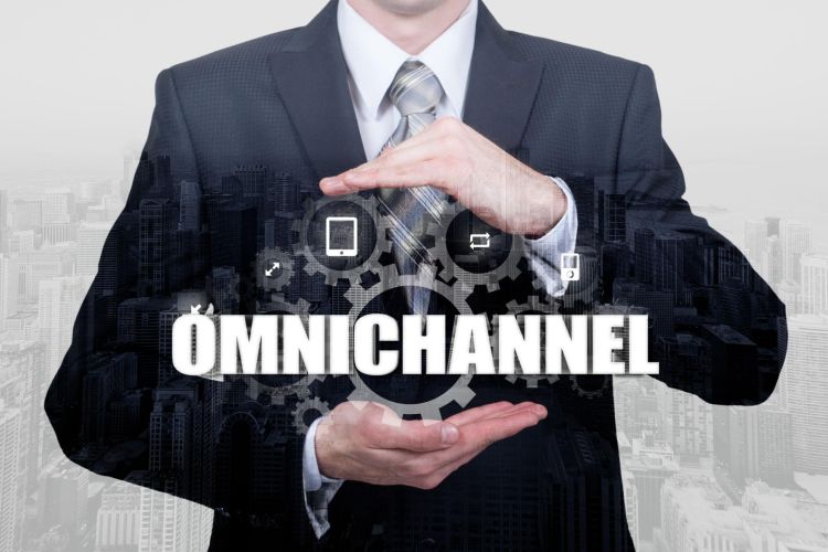 Business professional presenting omnichannel programmatic advertising strategy with integrated digital channels and automation.