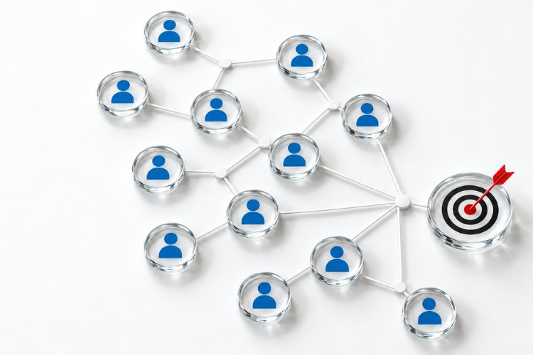 A network of connected people icons converging on a bullseye target, illustrating focused audience targeting